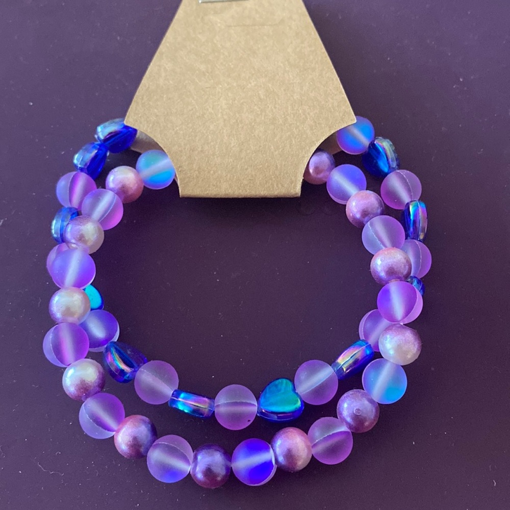 Set of two glass, beaded illuminating bracelets, 6 1/2 inches with stretchiness